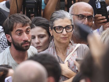 Francesca Albanese, the U.N. special rapporteur for the West Bank and Gaza, center, attend