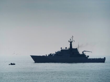 Royal Navy patrol ship HMS Tyne with her support vessel on patrol in the Channel off the c