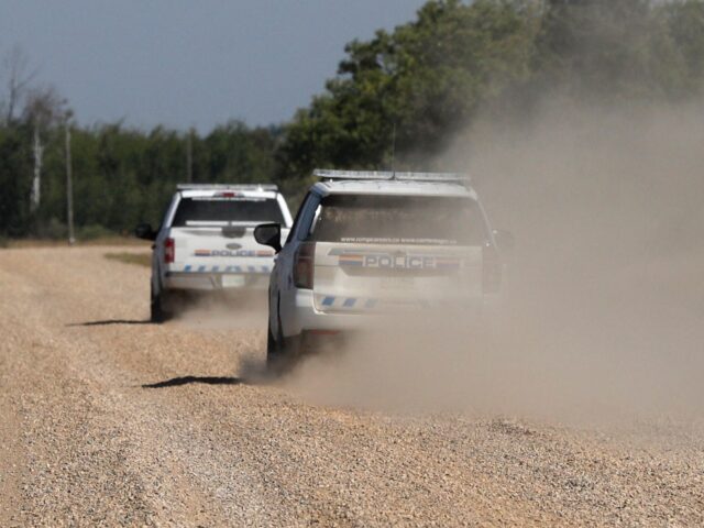 Royal Canadian Mounted Police vehicles patrol James Smith Cree Nation reserve in Canada on