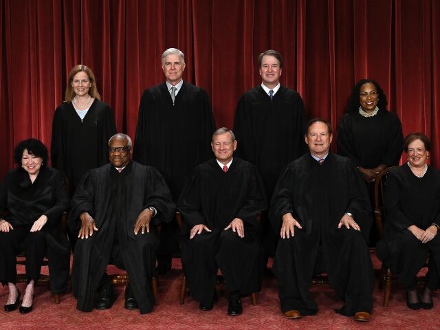Justices of the US Supreme Court pose for their official photo at the Supreme Court in Was