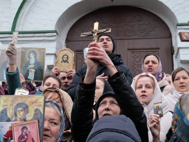 KYIV, UKRAINE - MARCH 31, 2023 - Supporters of the Ukrainian Orthodox Church of the Moscow