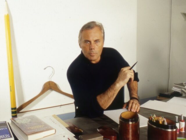 Italian fashion stylist Giorgio Armani sit in this office. Italy, 1984