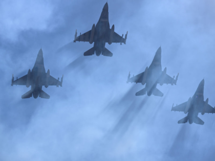 DENVER, CO - SEPTEMBER 17: Four F-16s from the 120th FS Buckley Space Force Base fly over