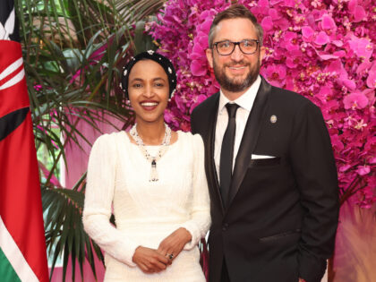 Representative Ilhan Omar, a Democrat from Minnesota, left, and Tim Mynett arrive to atten