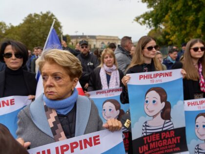 PARIS, FRANCE - SEPTEMBER 29: Women carry placards with the image of Philippine on Septemb