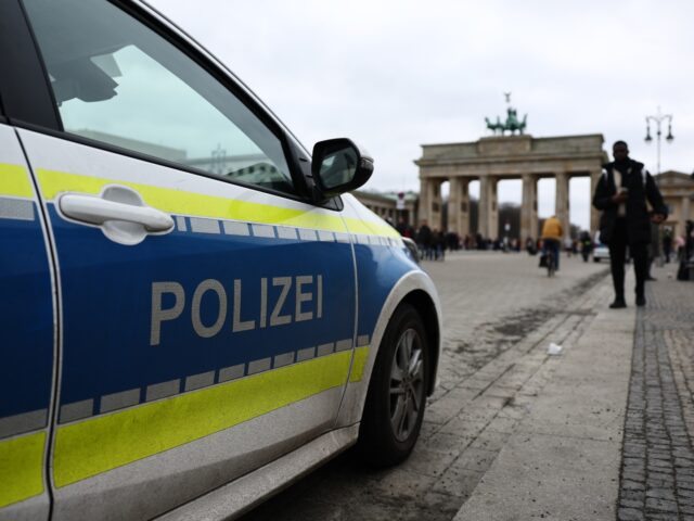 Police car is seen in front of the Brandenburg Gate in Berlin, Germany on February 23, 202