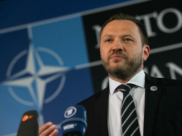 Estonia's Foreign Minister Margus Tsahkna talks to the press as he arrives for an informal