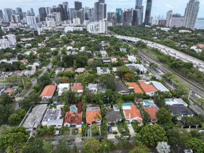 MIAMI, FLORIDA - MAY 12: In an aerial view, a residential neighborhood is close to the Ci