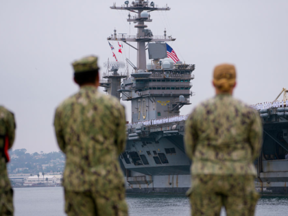 Coronado , CA - August 14: Sailors man the rails as the Carl Vinson pulls into San Diego B