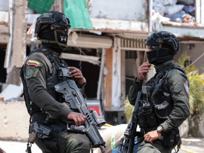 Members of the Colombian National Police's Special Operations Group (GOES) stand guard at