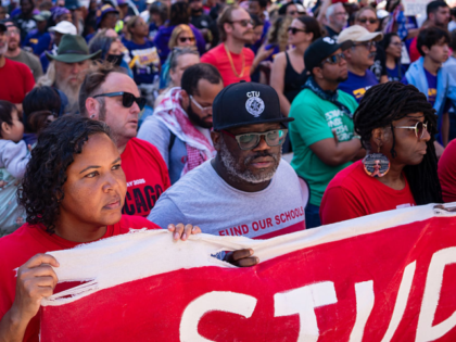 CHICAGO, ILLINOIS - SEPTEMBER 1: People participate in the Labor Day Workers Over Billiona