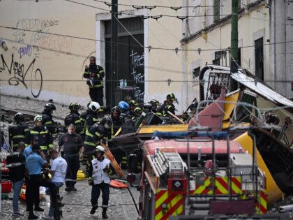 LISBON, PORTUGAL - SEPTEMBER 03: Rescuers and firefighters operate at the scene after the