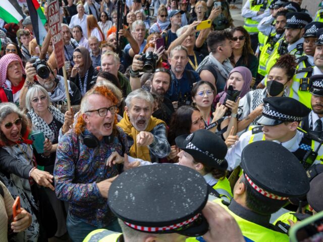 Hundreds of people opposing the ongoing genocide in Gaza who supporter the group Palestine