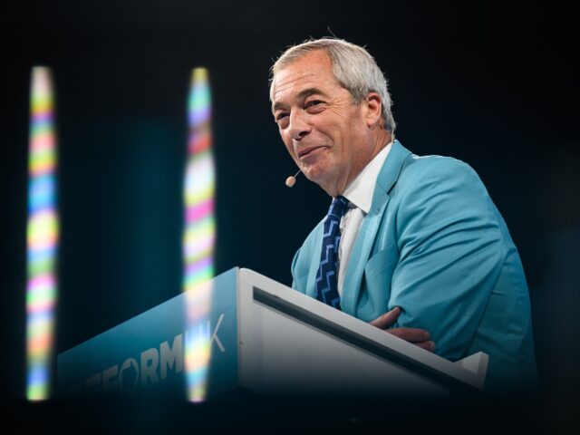 BIRMINGHAM, ENGLAND - SEPTEMBER 05: Leader of Reform UK Nigel Farage addresses delegates t