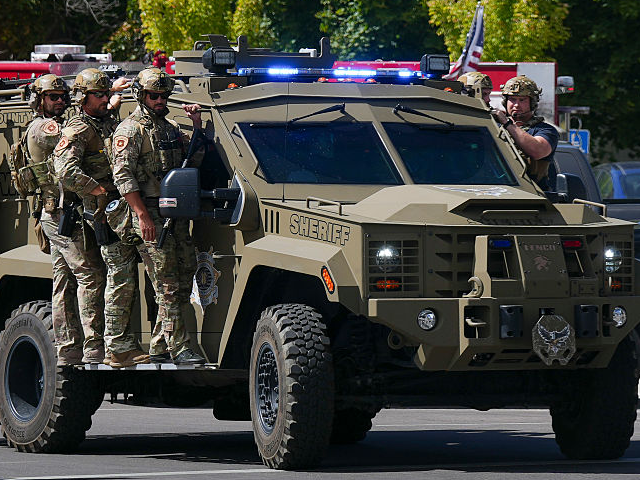 GettyImages-2234098021 OREM, UTAH - SEPTEMBER 10: Law enforcement arrive at the scene where conservative activist