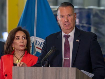 PASADENA, TEXAS - SEPTEMBER 3: U.S. Attorney Jeanine Ferris Pirro, left, listens as ICE Ac