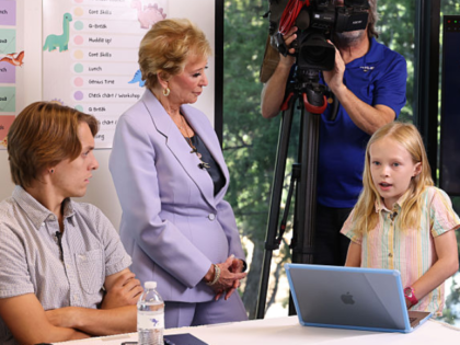 AUSTIN, TEXAS - SEPTEMBER 09: (L-R) Noah Lightfoot, U.S. Secretary of Education Linda McMa