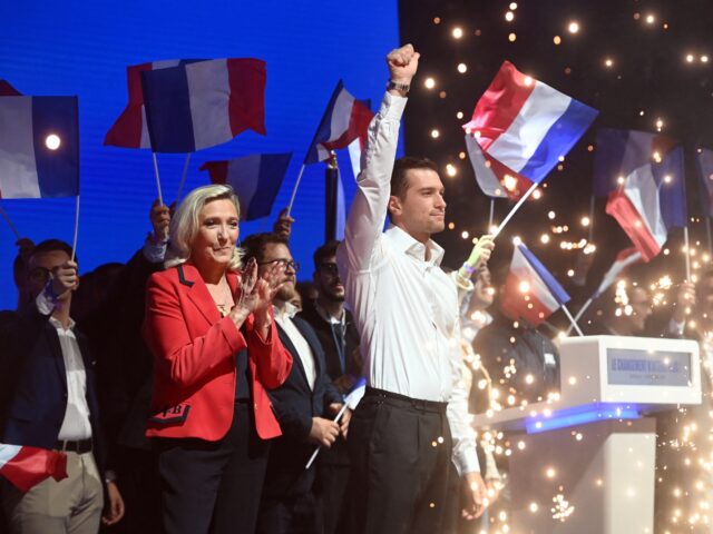 President of Rassemblement National (RN) Jordan Bardella (C,R) and President of Rassemblem