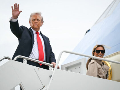 US President Donald Trump and First Lady Melania Trump board Air Force One at Joint Base A