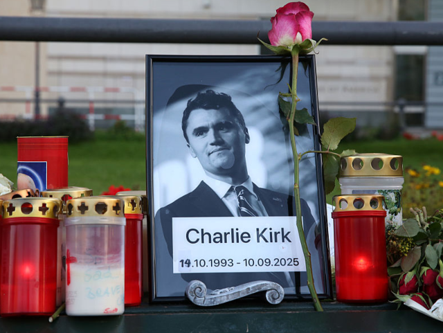 GettyImages-2235415785 BERLIN, GERMANY - SEPTEMBER 14: Flowers and candles are seen at a makeshift memorial for m