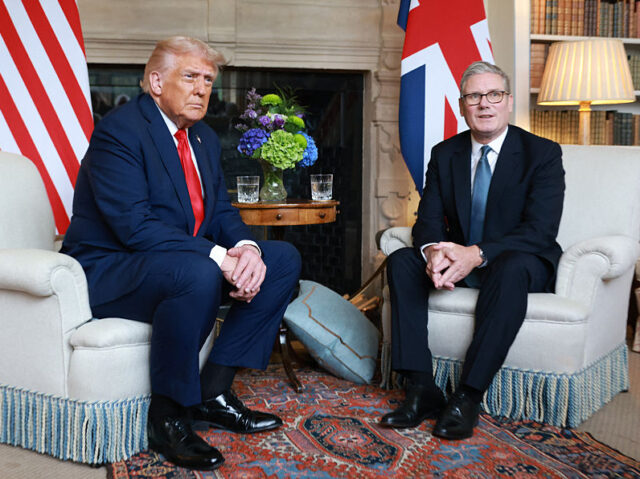 Britain's Prime Minister Keir Starmer and US President Donald Trump sit down for a bi