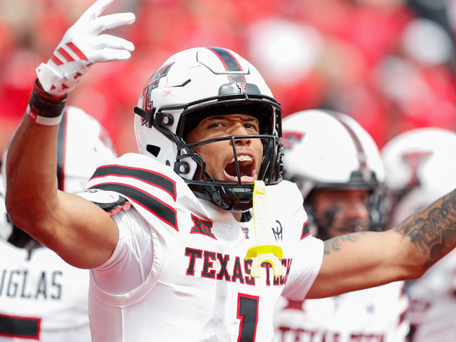SALT LAKE CITY, UT - SEPTEMBER 20: Reggie Virgil #1 of the Texas Tech Red Raiders celebrat