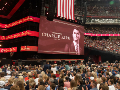 An image of Turning Point USA founder Charlie Kirk during a memorial service at State Farm
