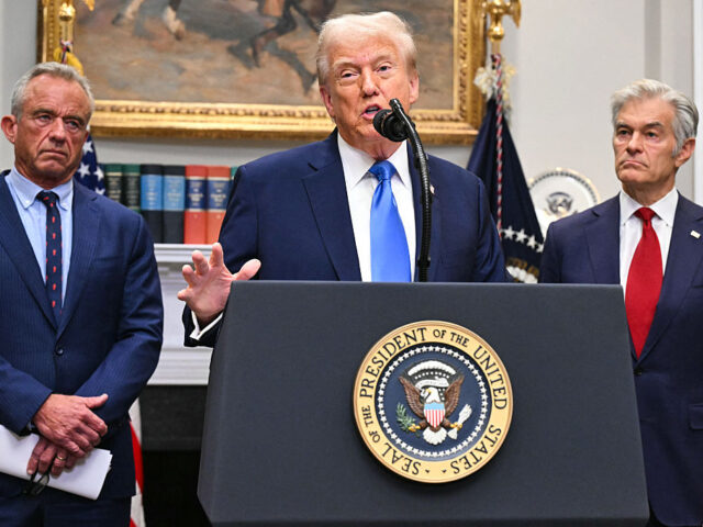 US-POLITICS-HEALTH-TRUMP US President Donald Trump (C), alongside Secretary of Health and Human Services Robert F.
