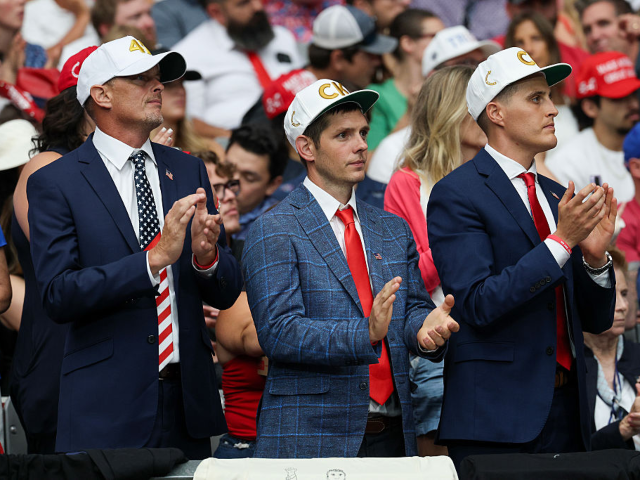 GLENDALE, ARIZONA - SEPTEMBER 21: Attendees watch the memorial service for political activ