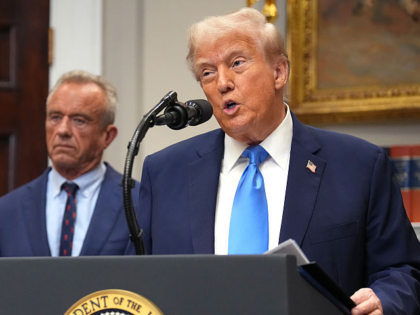 WASHINGTON, DC - SEPTEMBER 22: U.S. President Donald Trump (R), accompanied by Health and