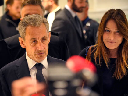 PARIS, FRANCE - SEPTEMBER 25: Former French president Nicolas Sarkozy and with wife Carla