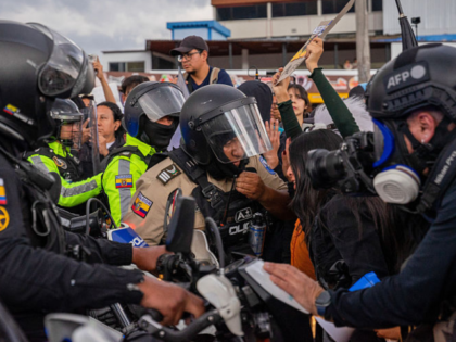 QUITO, PICHINCHA, ECUADOR - 2025/09/23: Students confront police officers during the demon