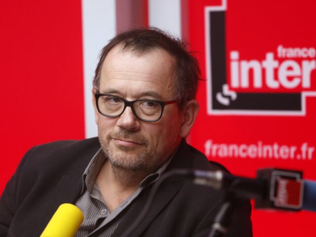 French journalist Thomas Legrand takes part in a news show of French radio station France-