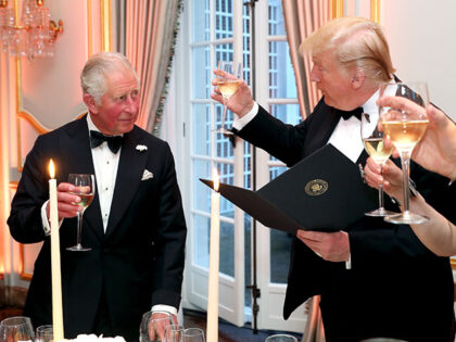 US President Donald Trump (R) and First Lady Melania Trump host a dinner at Winfield House