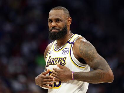 LeBron James #23 of the Los Angeles Lakers looks on against the Minnesota Timberwolves in