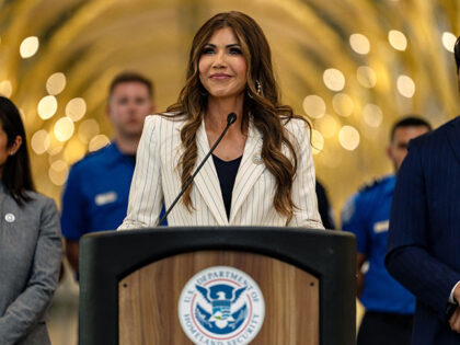 U.S. Secretary of Homeland Security Kristi Noem, flanked by Deputy Administrator of the Tr
