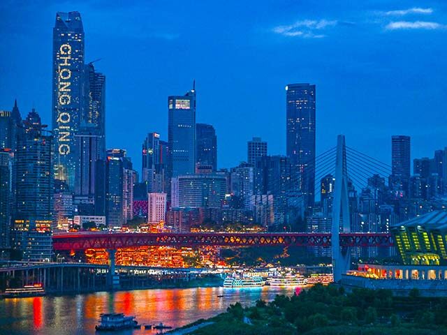 GettyImages2231241145 This photo shows the city view at dusk in southwest China's Chongqing Municipality, Aug. 2