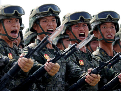 The formation of the People's Armed Police Force marches through Tian'anmen Square during