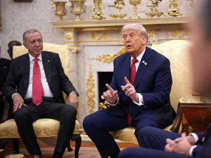 U.S. President Donald Trump (R) delivers remarks during a meeting with President of Turkey