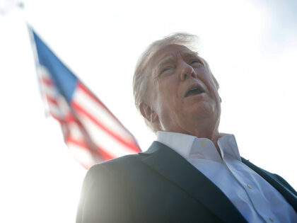U.S. President Donald Trump speaks to members of the media as he departs the White House o