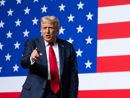 US President Donald Trump departs after addressing senior military officers gathered at Ma