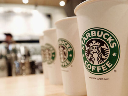 Beverage cups featuring the logo of Starbucks Coffee are seen in the new flagship store on