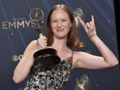 Hannah Einbinder poses in the press room with the Emmy for Outstanding Supporting Actress