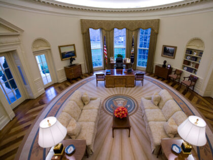An intererior view of the Oval Office at the White House, empty of people during the Georg