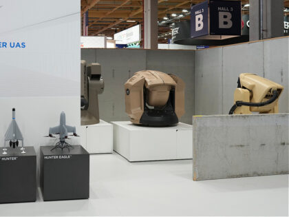 Iron Beam Laser Weapon System, right, are seen on the Rafael stand in the Israeli pavilion