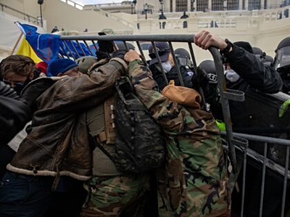 WASHINGTON DC - JANUARY 6: Pro-Trump protestors clash with police during the tally of elec