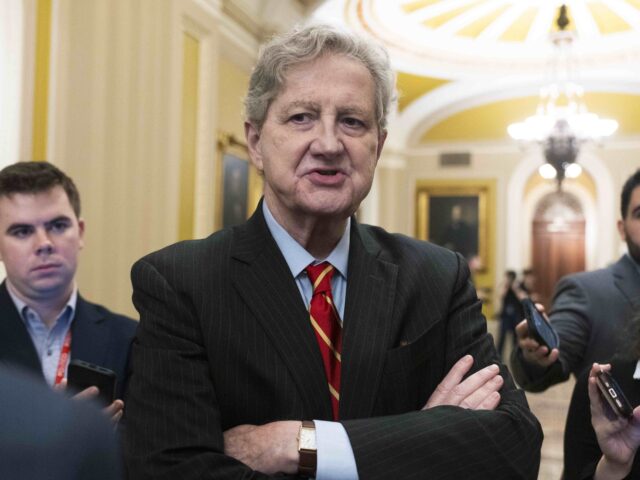 Sen. John Kennedy, R-La., speaks to reporters outside the Senate chamber as Republicans be