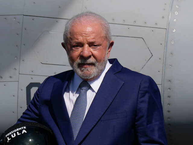 Luiz Inácio Lula da Silva Brazilian President Luiz Inacio Lula da Silva poses for photos in front of a new F-39 Grip