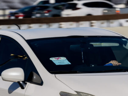 Lyft signage on a vehicle at San Francisco International Airport (SFO) in San Francisco, C