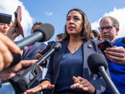 Rep. Alexandria Ocasio-Cortez, D-N.Y., talks with reporters outside the U.S. Capitol about